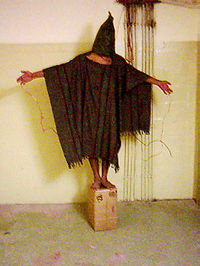 200px-abughraibabuse-standing-on-box.jpg